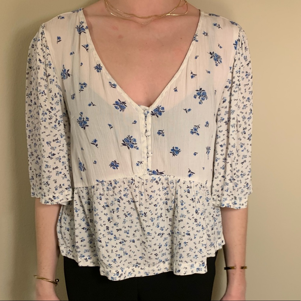 White blouse with blue flowers